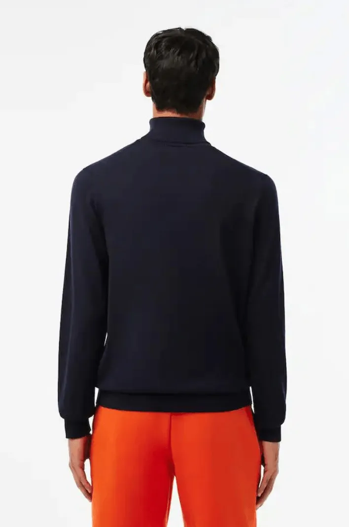 Pull col roulé Lacoste marine en laine