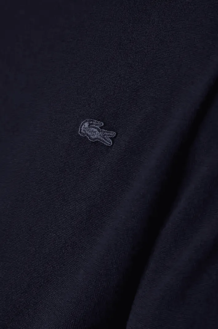 Pull col roulé Lacoste marine en laine
